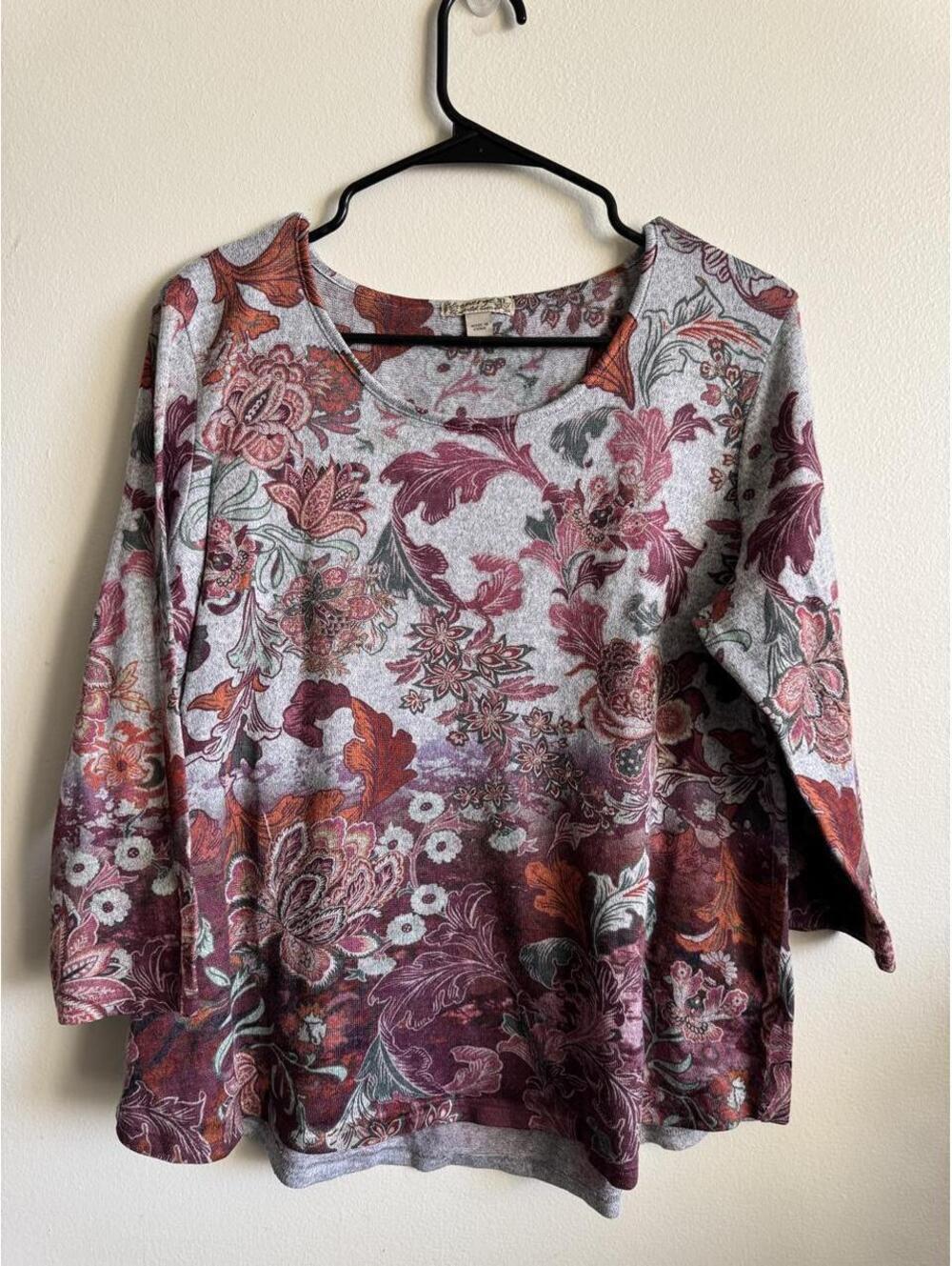 Energe floral sweater with red, purple, and gray flowers and leaves